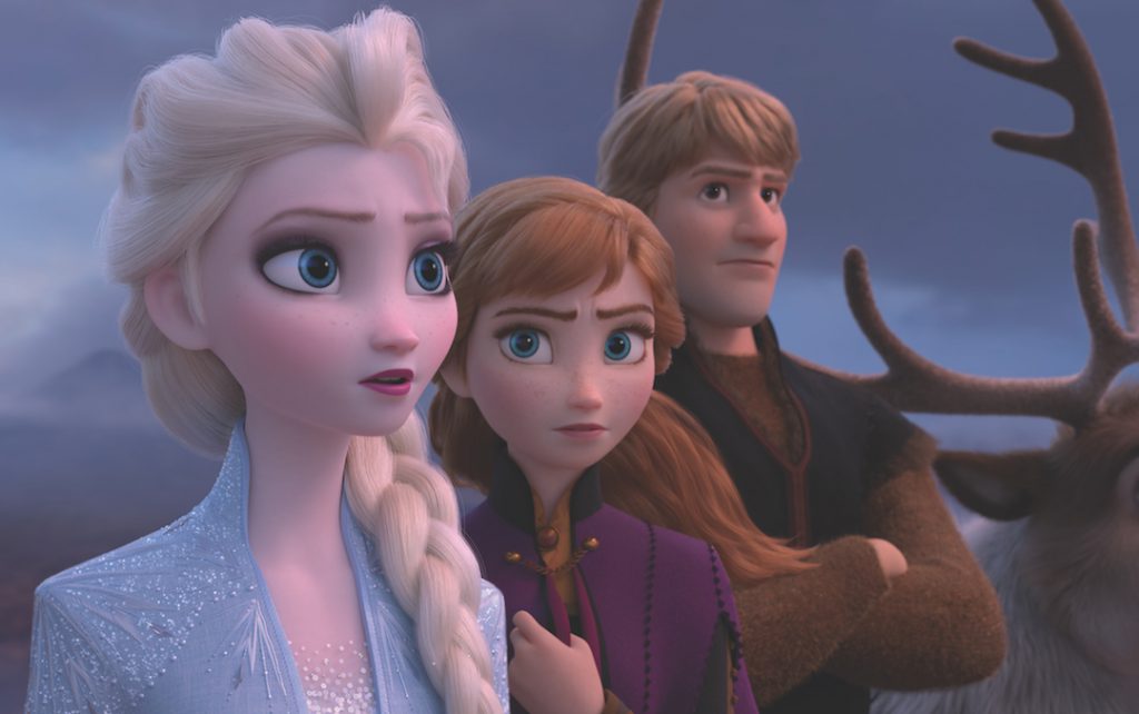 Elsa, Anna, and Kristoff look out over a fjord in 'Frozen 2' (Credit: Disney/Pixar)