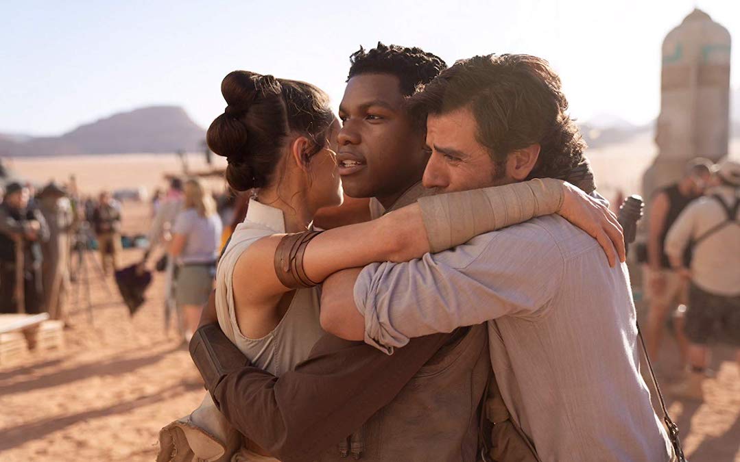 Rey (Daisy Ridley), Finn (John Boyega) and Poe Dameron (Oscar Isaac) all share a hug in 'Star Wars: The Rise of Skywalker' (Courtesy: Lucasfilm)