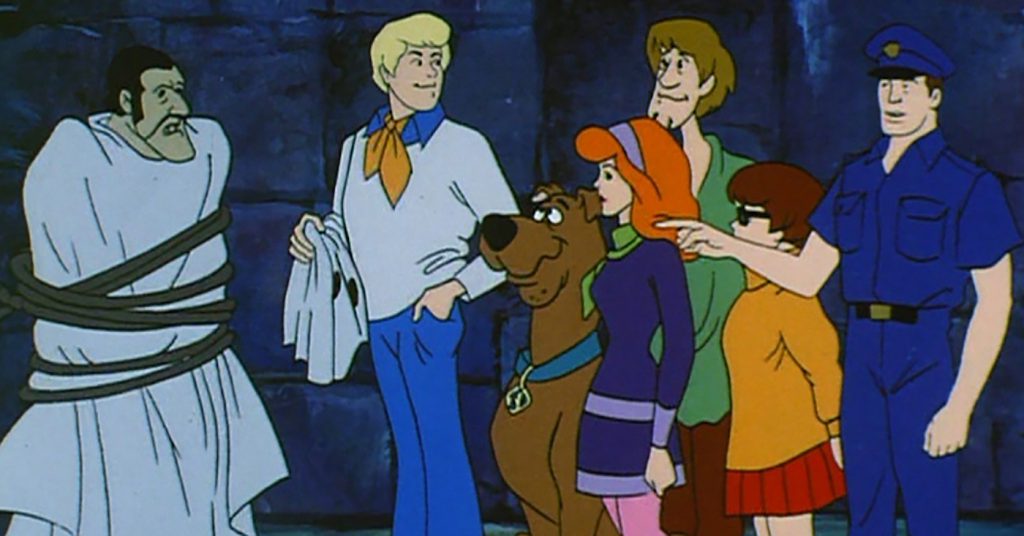 A group of people posing for the camera
Description automatically generated
