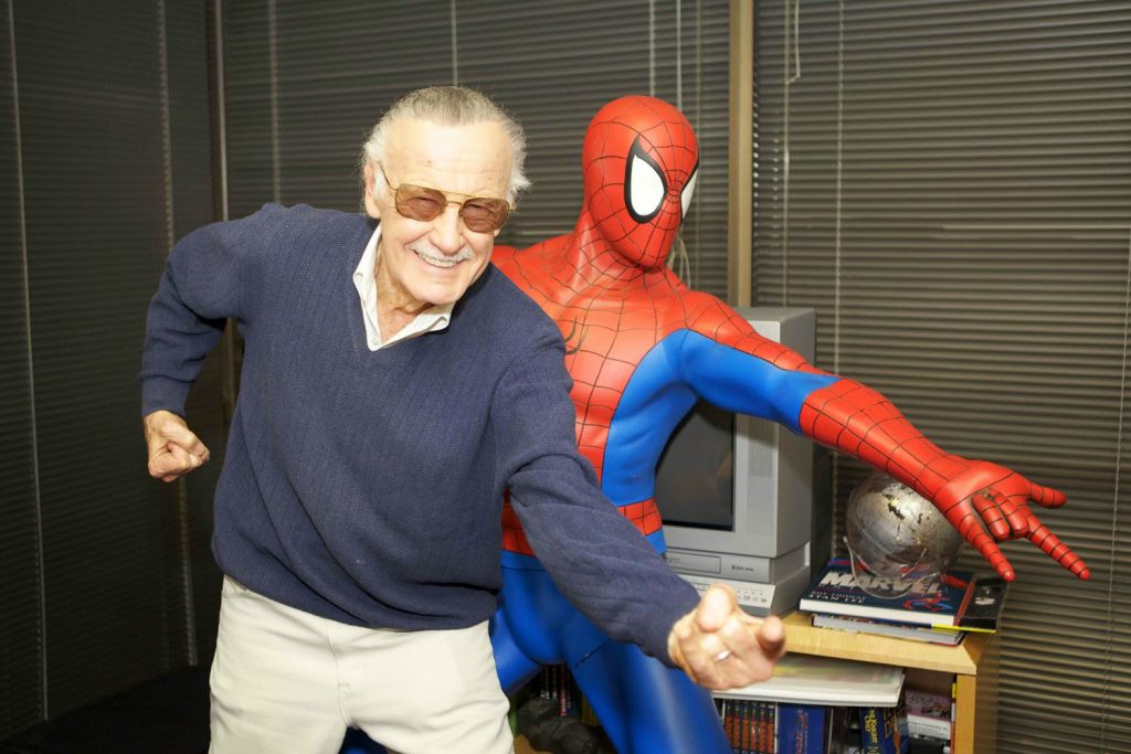 Stan Lee posing with Spider-Man